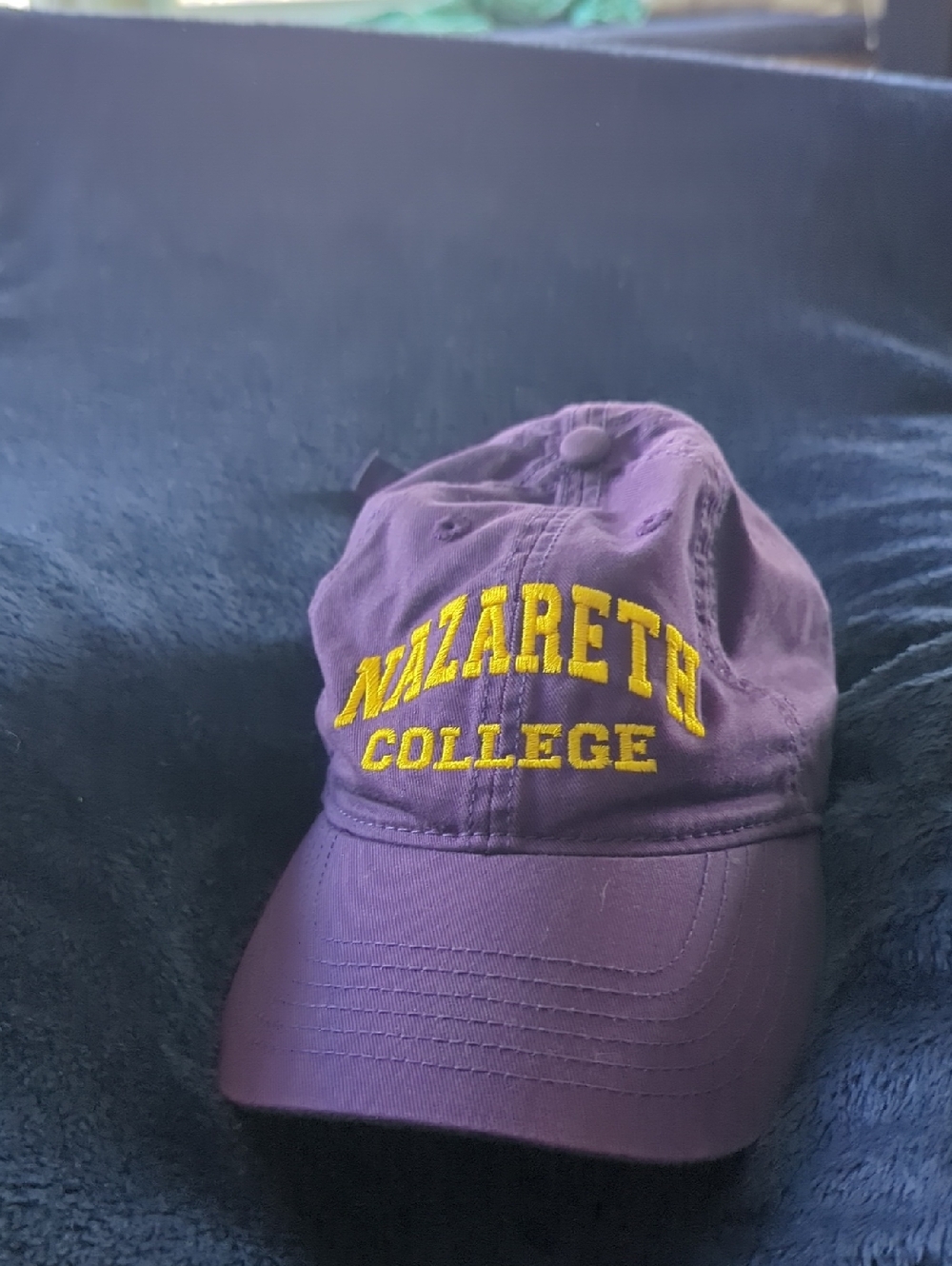 Legacy Purple Nazareth College Baseball Cap with Yellow Embroidery